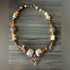 Jesse James beaded necklace with pendent. 19 inches total length. Toggle clasp.